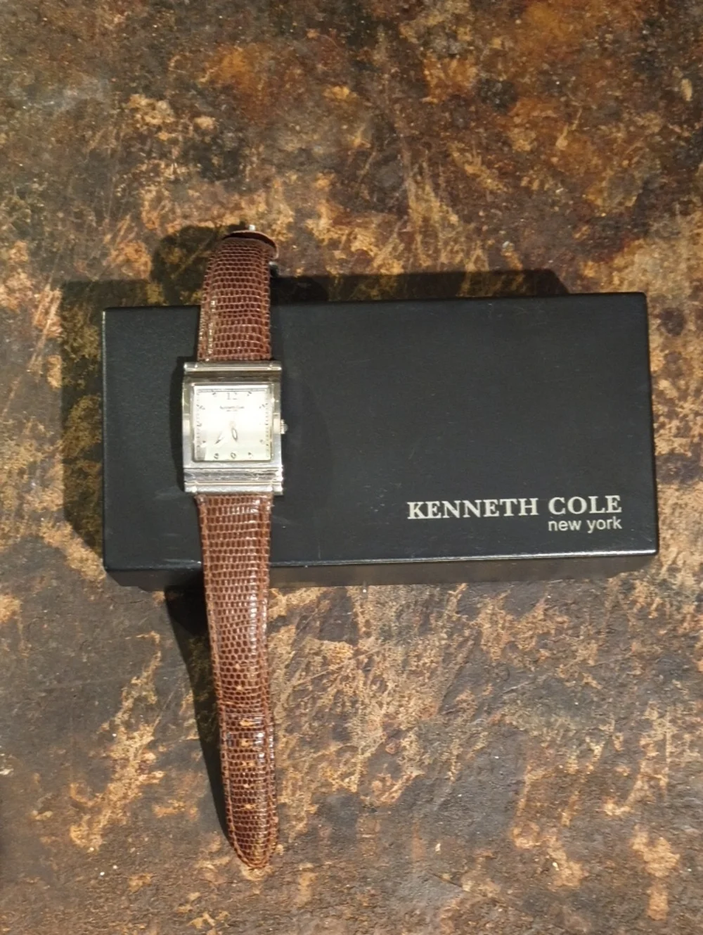 Kenneth Cole New York Ladies Silver Case Watch with Brown Lizard Style Band Cool